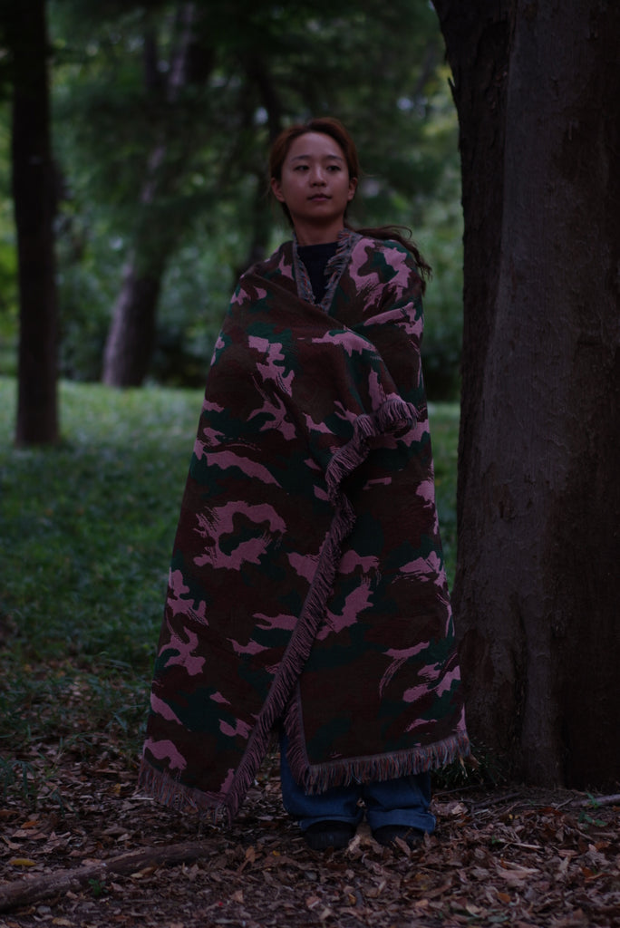 In the pink blanket