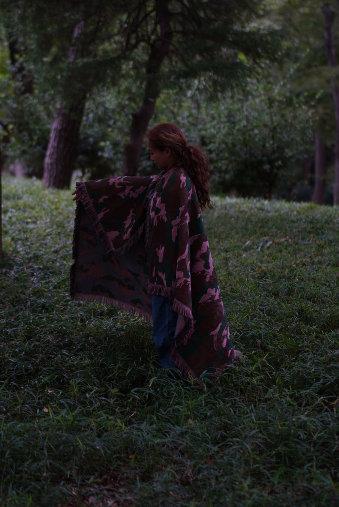 In the pink blanket