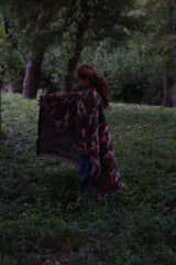 In the pink blanket